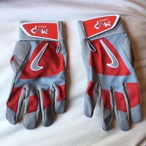 Red and gray Nike MVP Edge baseball gloves
